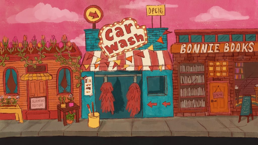 A front view of stores along a city’s main street. A car wash, seemingly out of place, is sandwiched in between a flower shop and a bookstore.