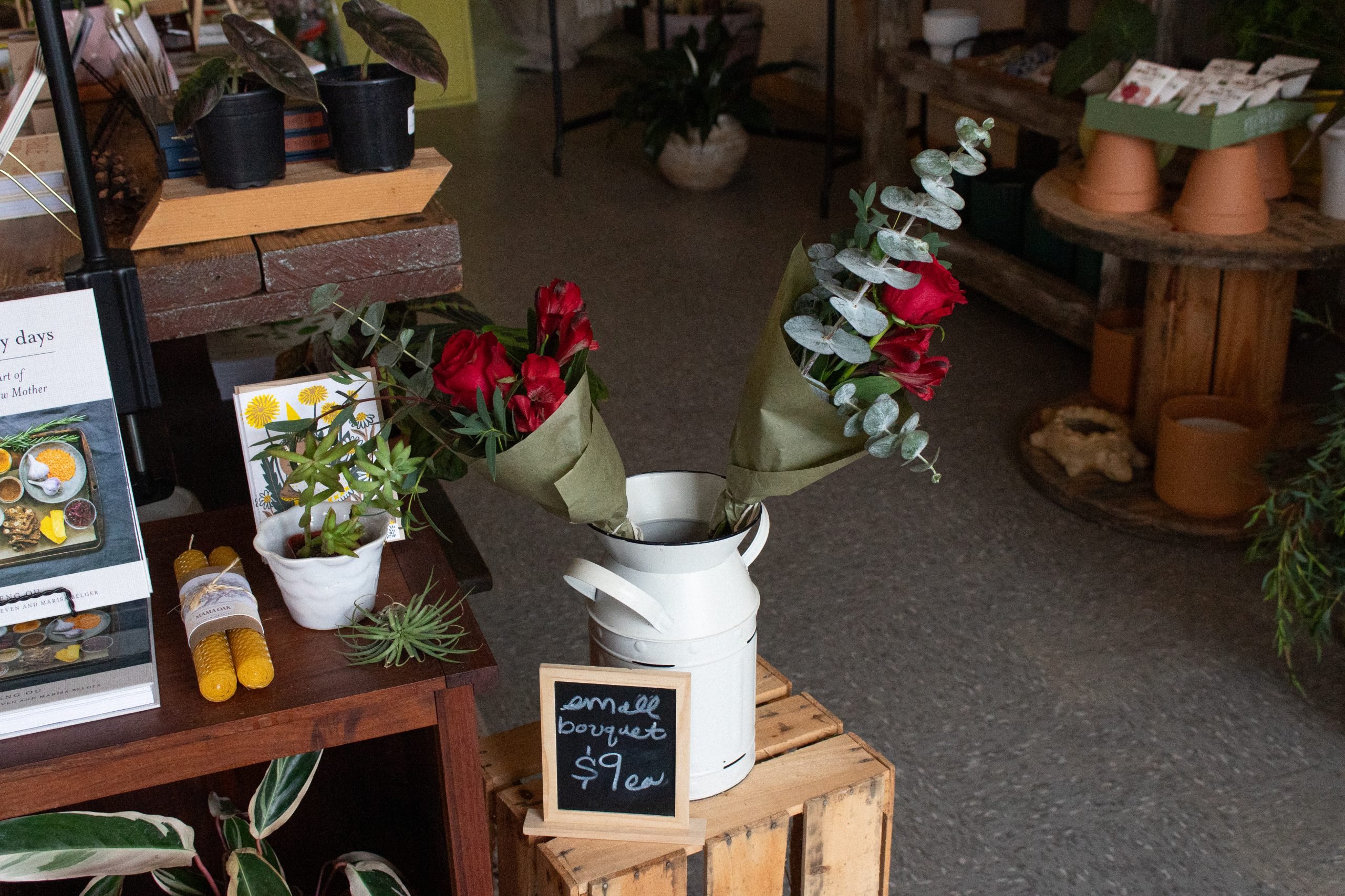 Two small red bouquets on sale for $9 each.
