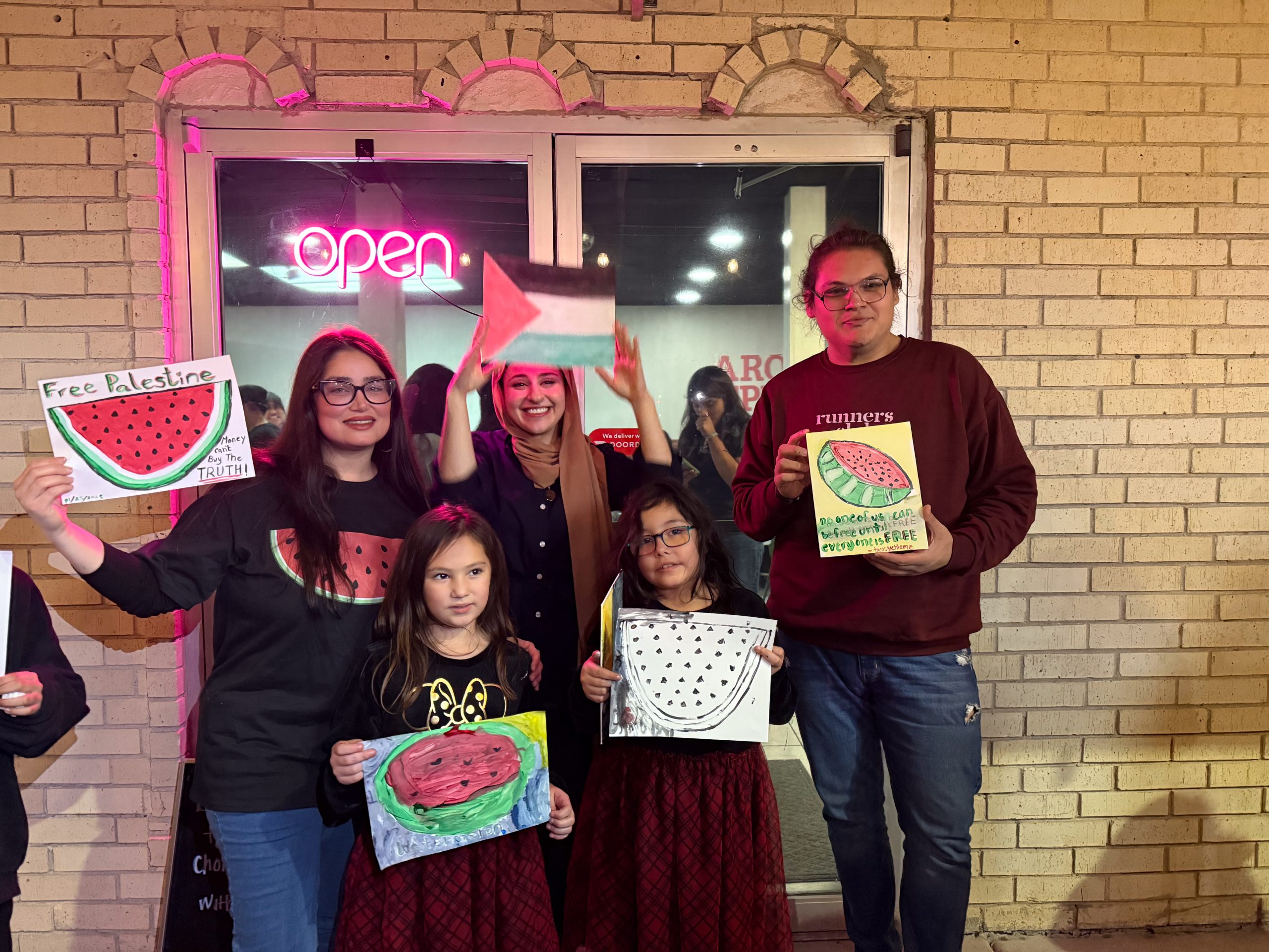 Paint and sip attendees outside Aroma Espresso in Brownsville.