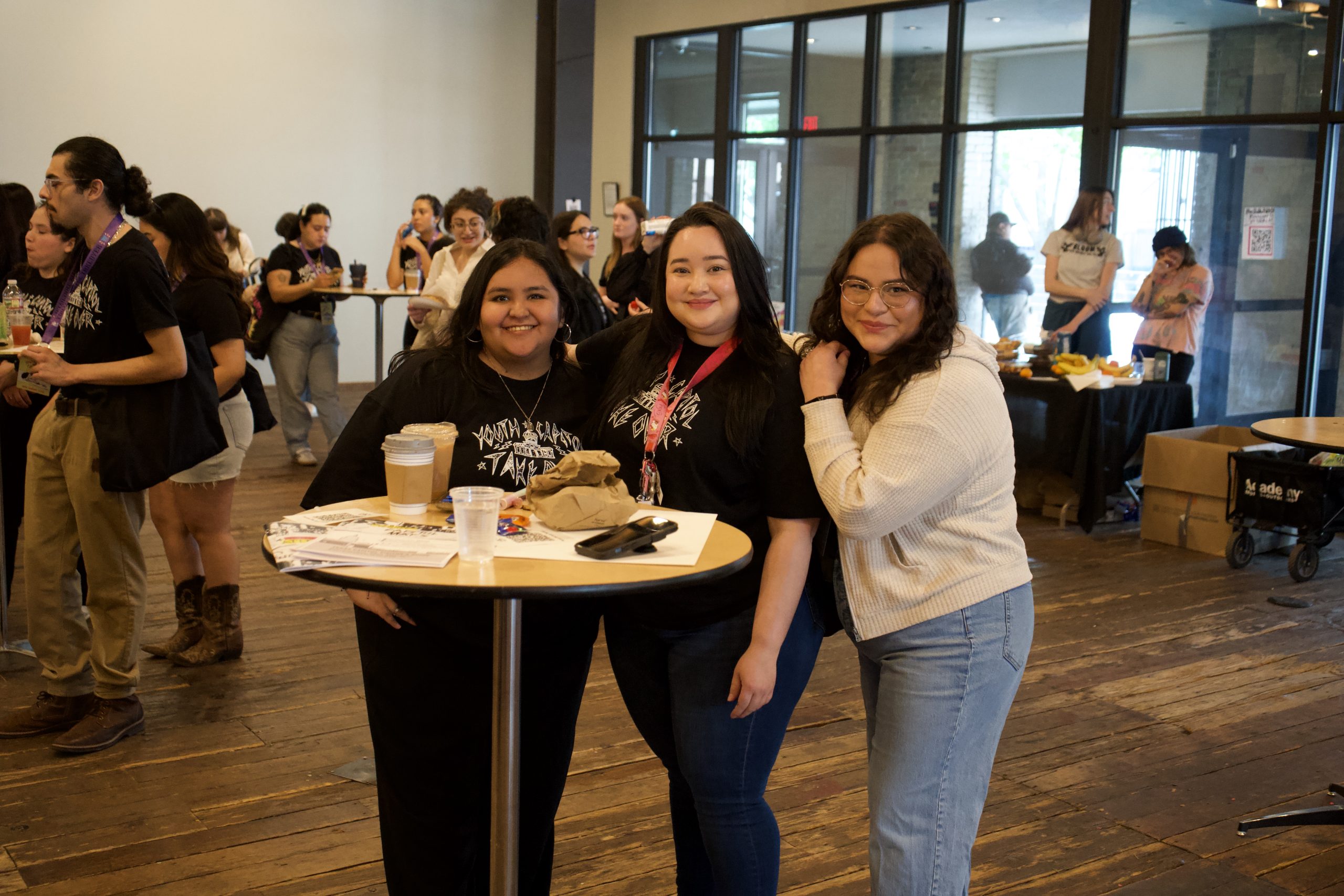 Three grassroots organizers posing for a photo.