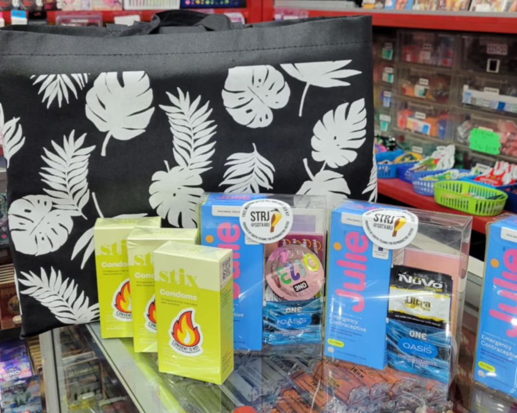 Yellow package of condoms and clear package of Plan B, distributed by local grassroots organization.