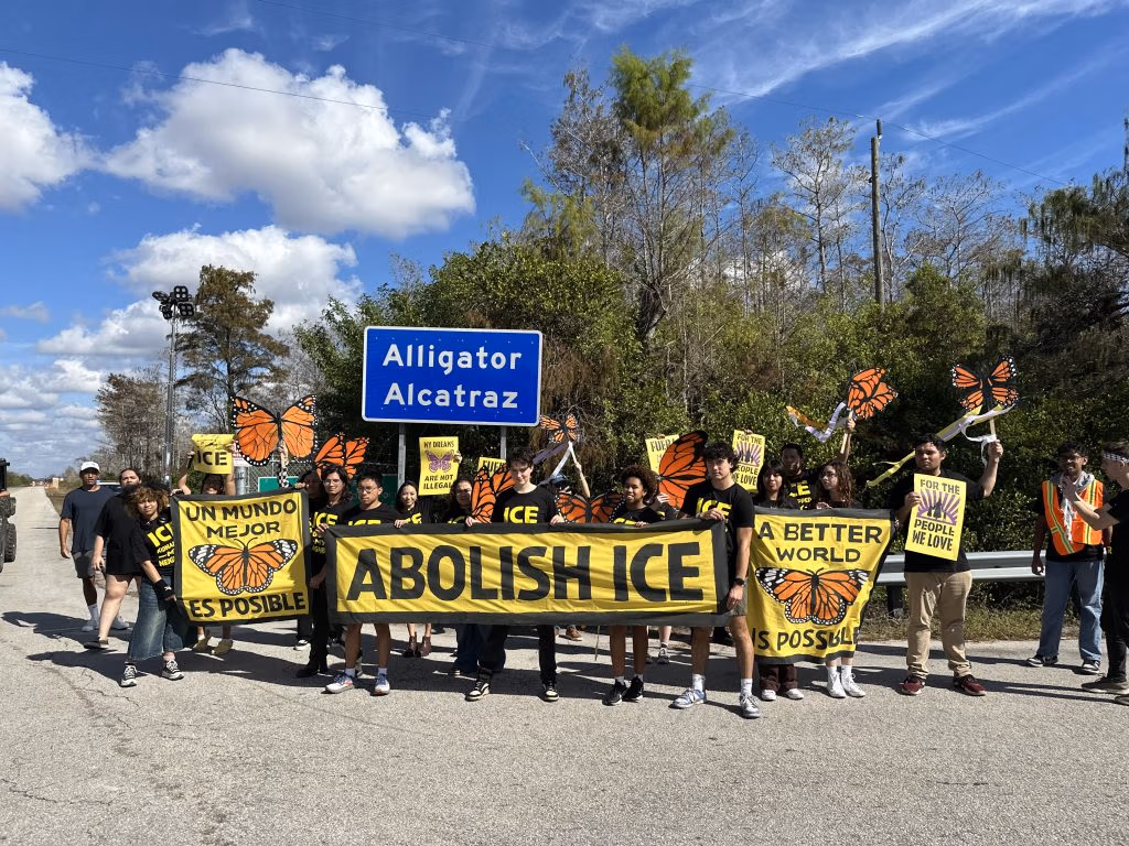 Sunrise National members outside the infamous Alligator Alcatraz.