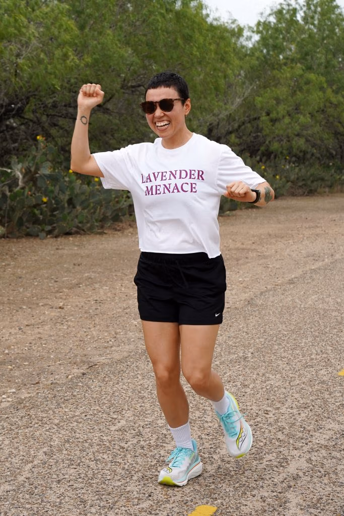Dani Marrero Hi, one of the RGV Queer Run Club’s cofounders, is making an exercise movement during a meetup.