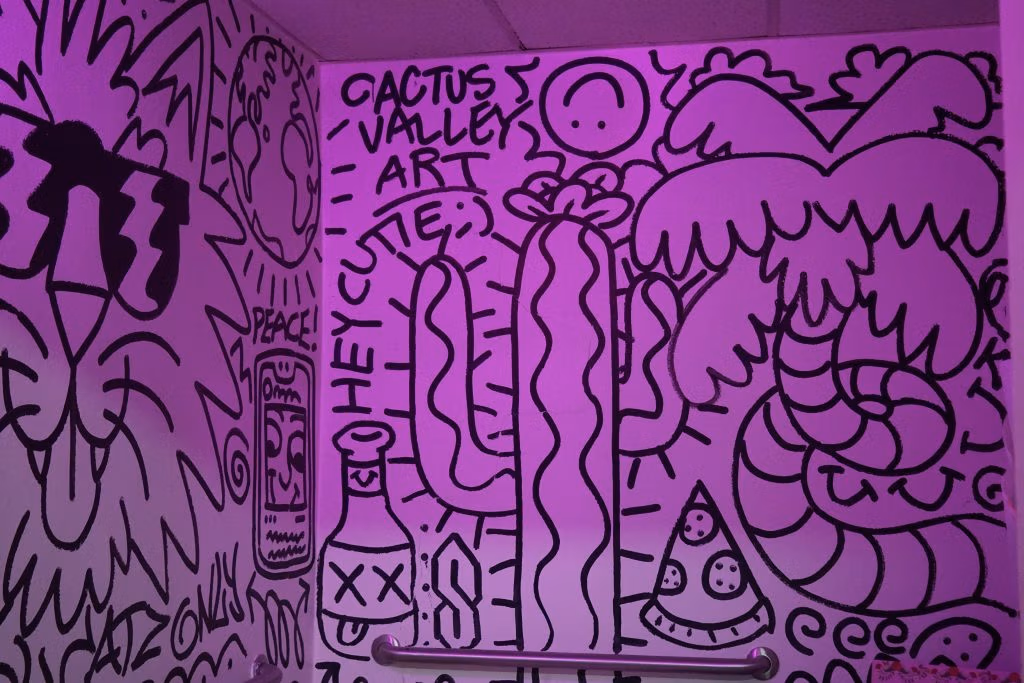 Doodles could be spotted all over the restroom or “Wiz Palace.”