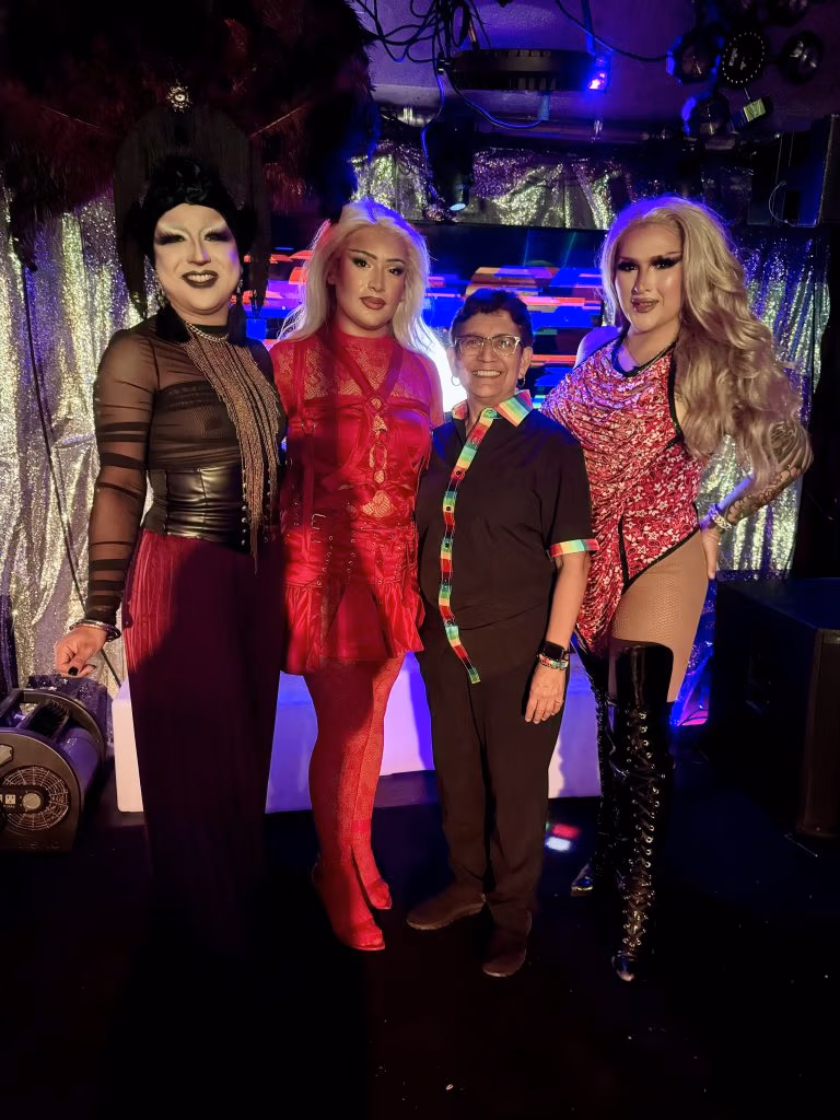 Esther Siller (middle) stands between drag artists Elypsys, Angelique K. Doll, and Luna Karr during 3rd anniversary drag brunch for Chicas Happy Hour.